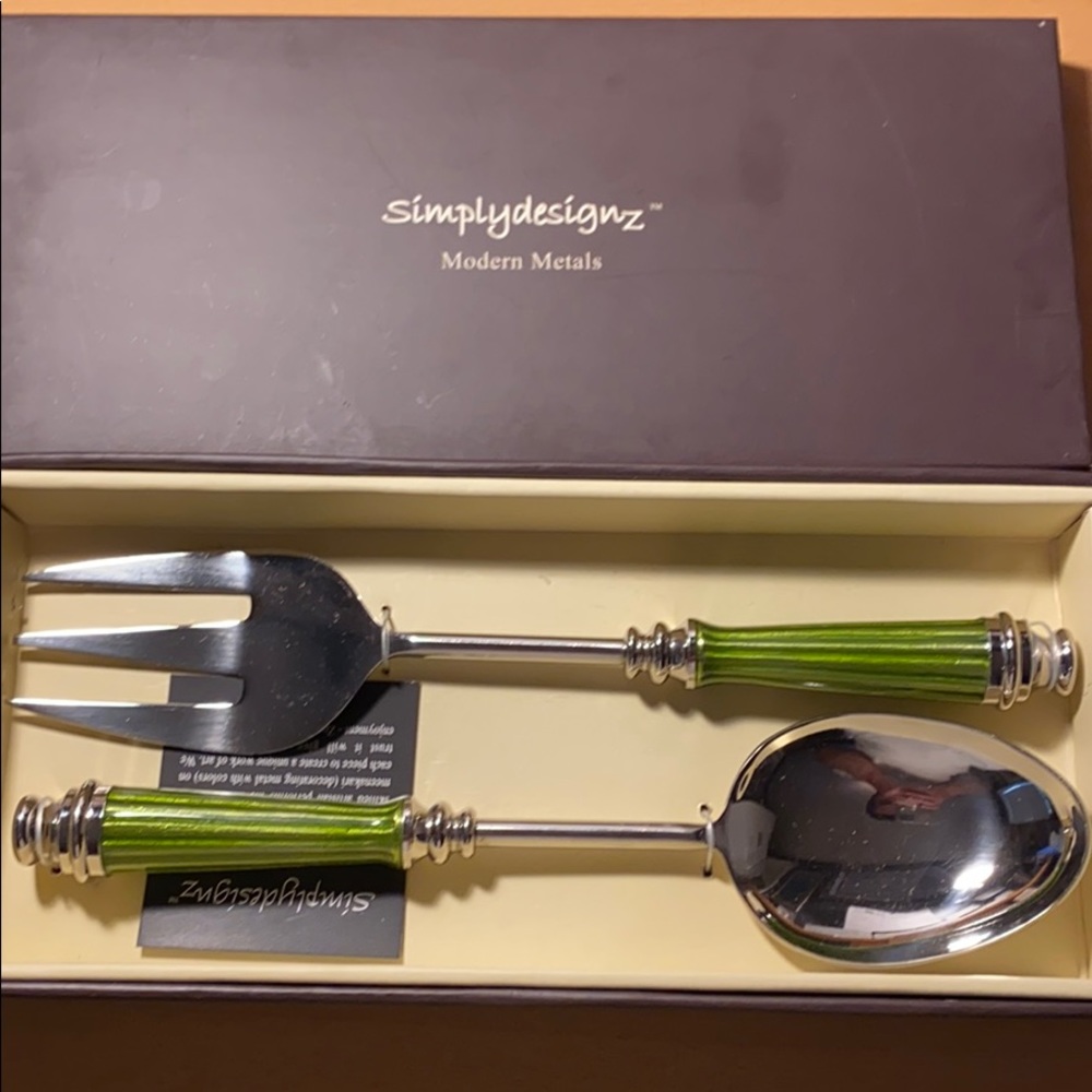 Very nice, fancy serving spoon and fork